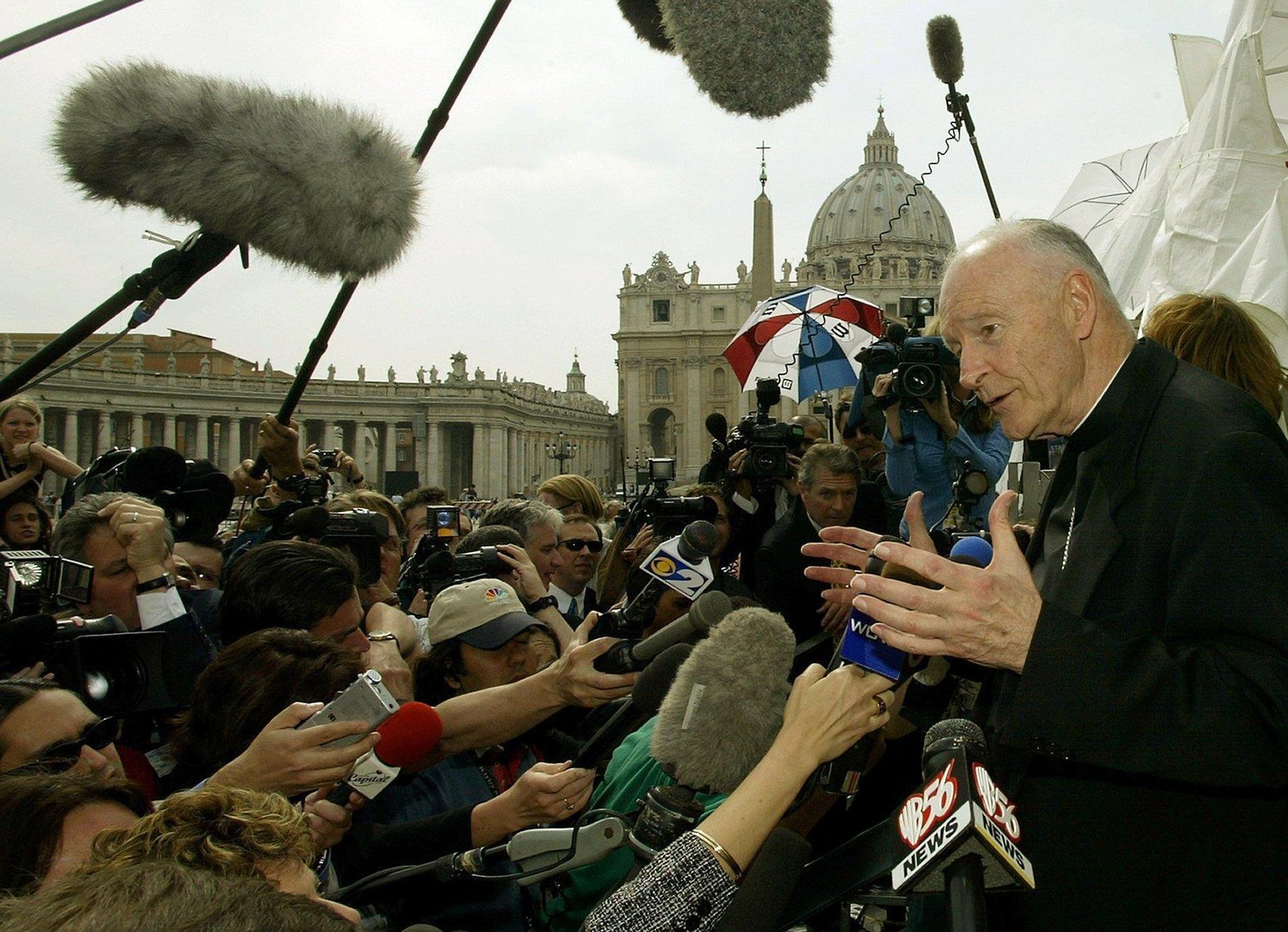 Then-Cardinal Theodore E. McCarrick of Washington faces the press in the shadow of St. Peter’s Basilica at the Vatican April 24, 2002. U.S cardinals met for a summit with Pope John Paul II at the Vatican April 23-24, 2002, as the sex abuse crisis unfolded in the United States. Cardinal McCarrick was a key spokesman for the bishops during the summit.